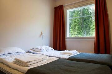 Фото номера Коттедж с 2 спальнями и сауной Дома для отпуска Kolin Lotus Cottages г. Колинкюла 18