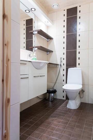 Фото номера Коттедж с 2 спальнями и сауной Дома для отпуска Kolin Lotus Cottages г. Колинкюла 24