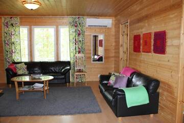 Фото номера Шале с 3 спальнями Шале Lake Cottage Jänisvaara г. Колинкюла 55
