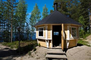 Фото номера Шале с 3 спальнями Шале Lake Cottage Jänisvaara г. Колинкюла 34