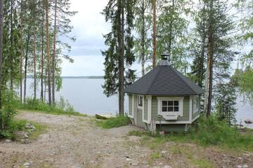 Фото номера Улучшенное шале с 3 спальнями Шале Lake Cottage Jänisvaara г. Колинкюла 11